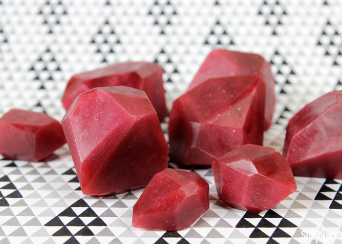 These Garnet Soap Gems are made with melt and pour soap and plenty of glitter. They make great holiday gifts, and are extremely easy to make!