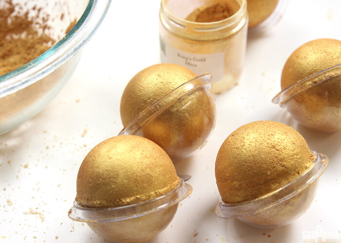 These bath bombs are covered in gold mica for a super sparkly effect!