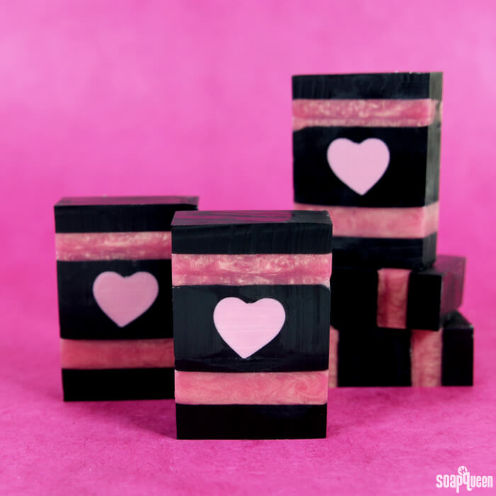 These adorable melt and pour soaps are made with activated charcoal and rose gold mica. Learn how to make them here!