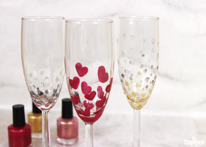 Use nail polish to create festive champagne glasses! Works great with other glass surfaces, such as wine or pint glasses.