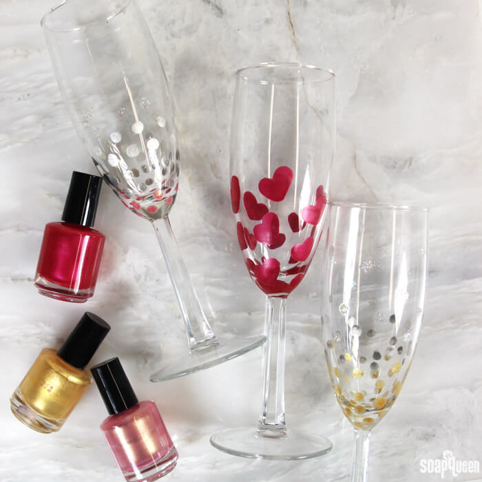 Use nail polish to create festive champagne glasses! Works great with other glass surfaces, such as wine or pint glasses.