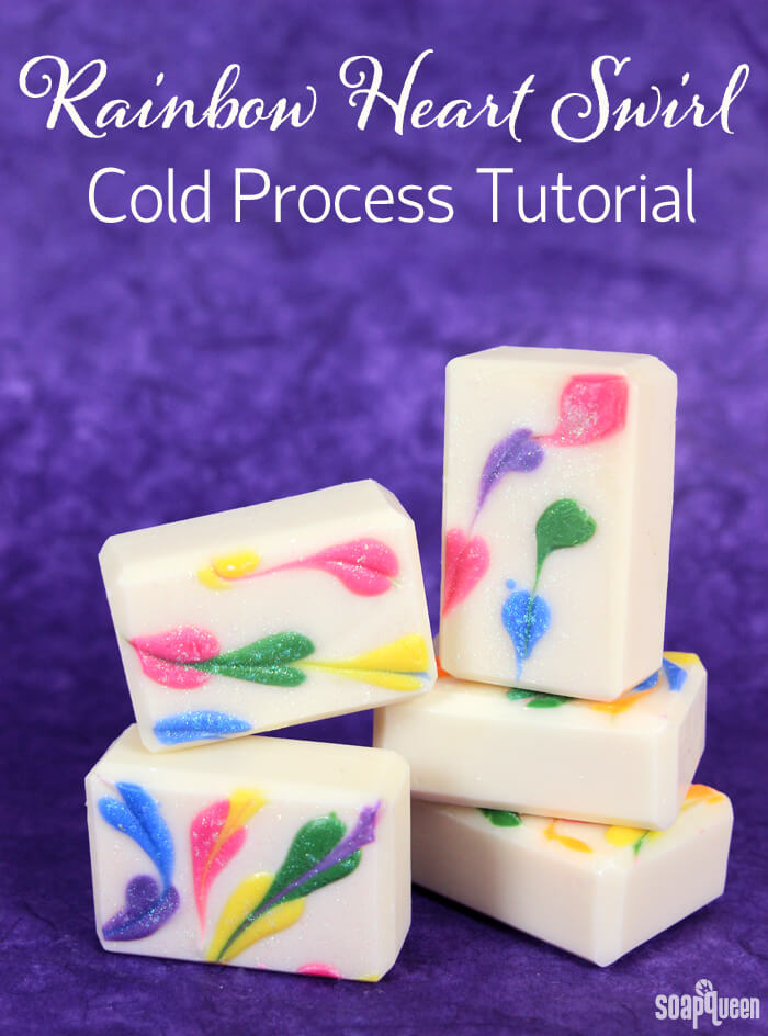 This Rainbow Heart Swirl Cold Process Soap features lots of color, glitter and smells like a tropical vacation!