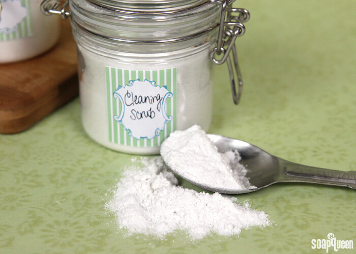 This natural soap scum cleaner is made with baking soda, pumice, and salts to scrub away dirt and grime.