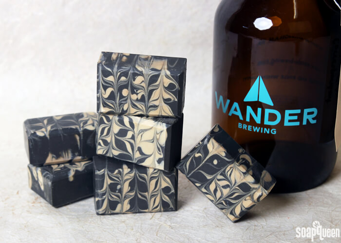 Learn how to make this Charcoal & Cedar Beer Cold Process Soap. It's scented with a natural blend of essential oils, and uses all natural colorants to create a beautiful contrasting swirl.