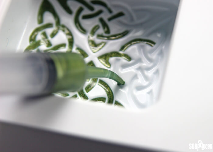 These Celtic Melt and Pour Soap Bars are made with green mica and Green Tea and Cucumber Fragrance Oil for a fresh scent.