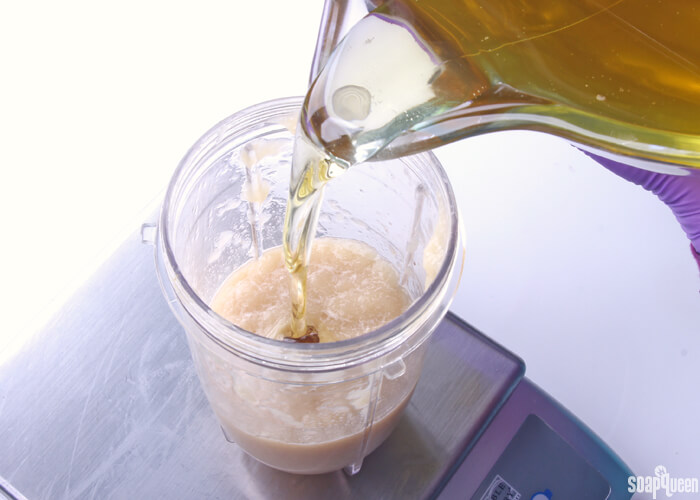 Blending the kombucha and SCOBY together to create a puree. This puree is added to the soap at trace.