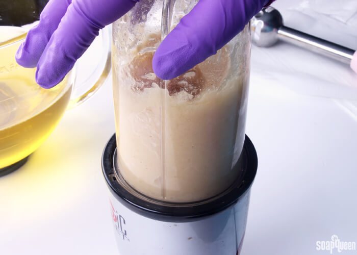 Blending the kombucha and SCOBY together to create a puree. This puree is added to the soap at trace.