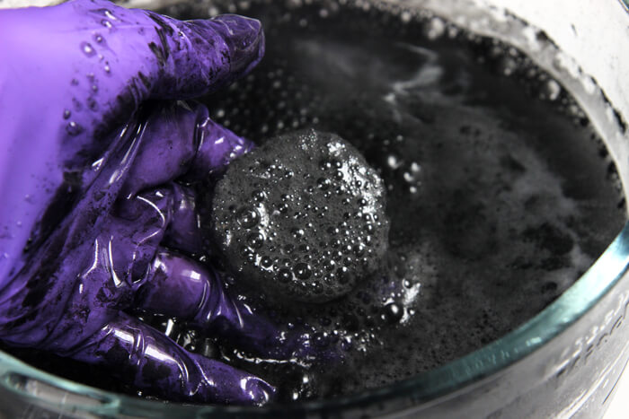 Black Bath Bombs: A Cautionary Tale // Black bath bombs have gone viral, but do they work? Several black bath bomb recipes are put to the test, including black bath bombs made with charcoal.
