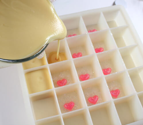 Pouring the cold process on top of the melt and pour.