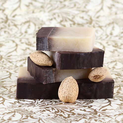 Cold process soap with almond meal, cocoa powder, and lavender essential oil.