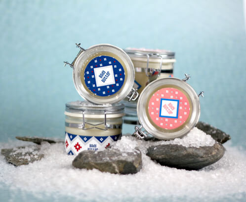 Winter body butter in finished packaging. This winter body balm is great for dry, winter skin. The tutorial also includes a free printable to package your jars.