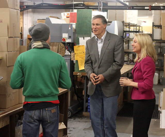 Anne-Marie and Jay Inslee chatting with Mark in shipping. Jay2