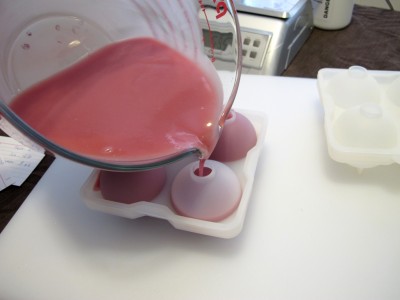 pouring into the sphere mold