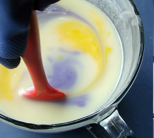 Swirling the soap in the pot.