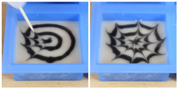 Using a toothpick to make spider webs in cold process soap.
