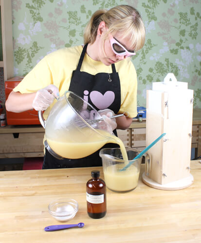 Anne-Marie pouring lye and oils.