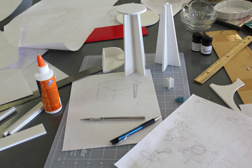 Guild sketches for the setup and display.