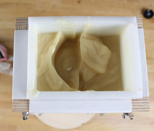 The divider has twisted the soap batter making the secret design.