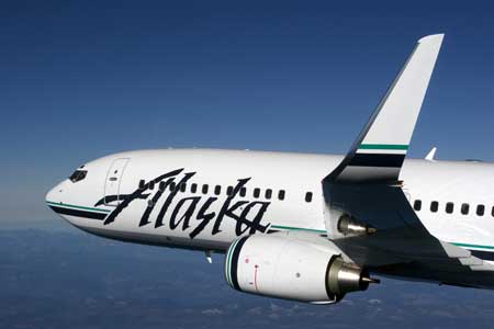 Alaska airlines plane in flight