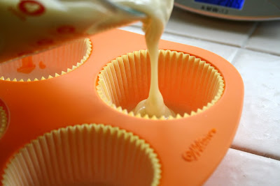 Pouring soap batter into cupcake mold